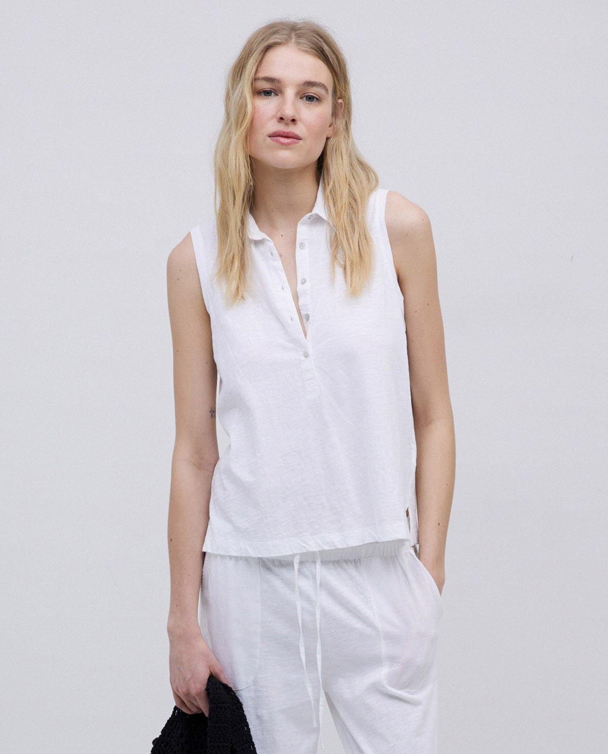Top cuello polo botones blanco