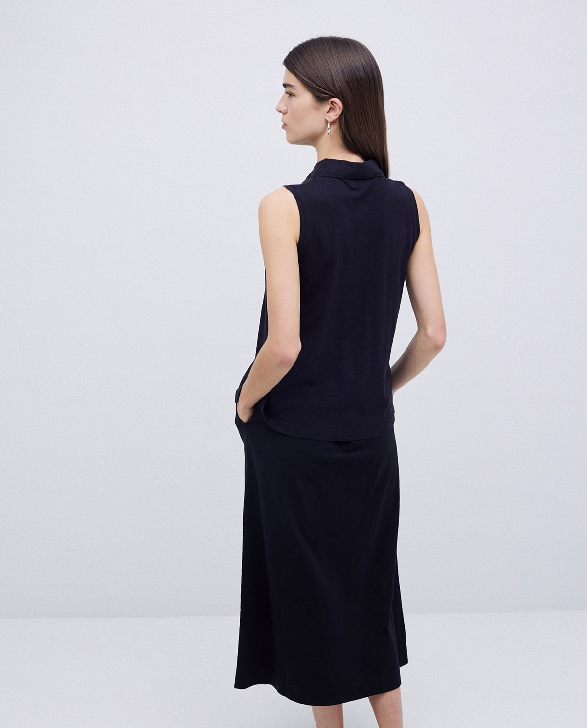 Top cuello polo botones negro 3