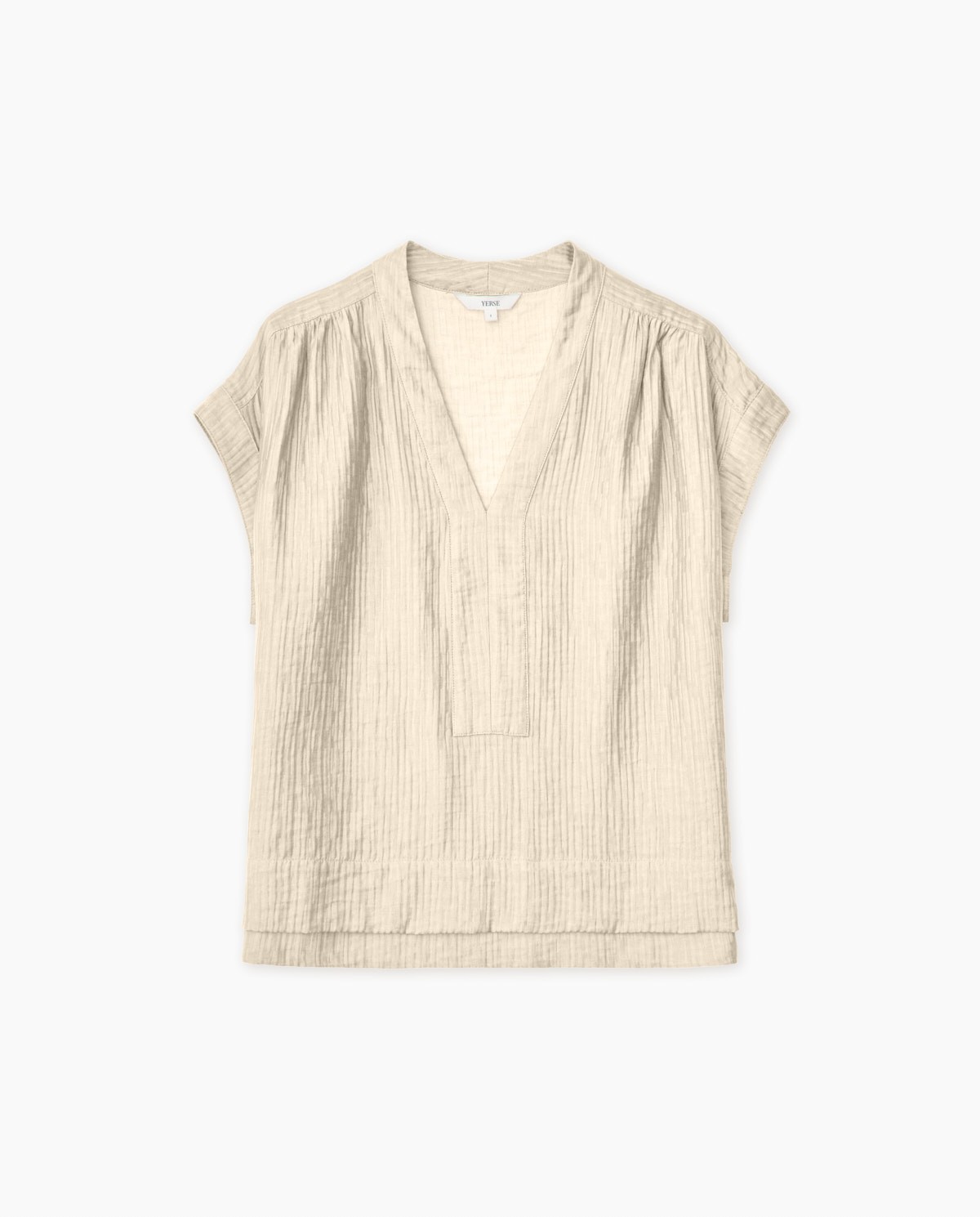 Blusa ondulaciones cuello pico vainilla