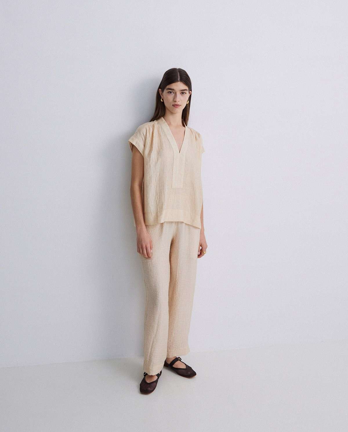 Pantalones wide leg ondulaciones vainilla