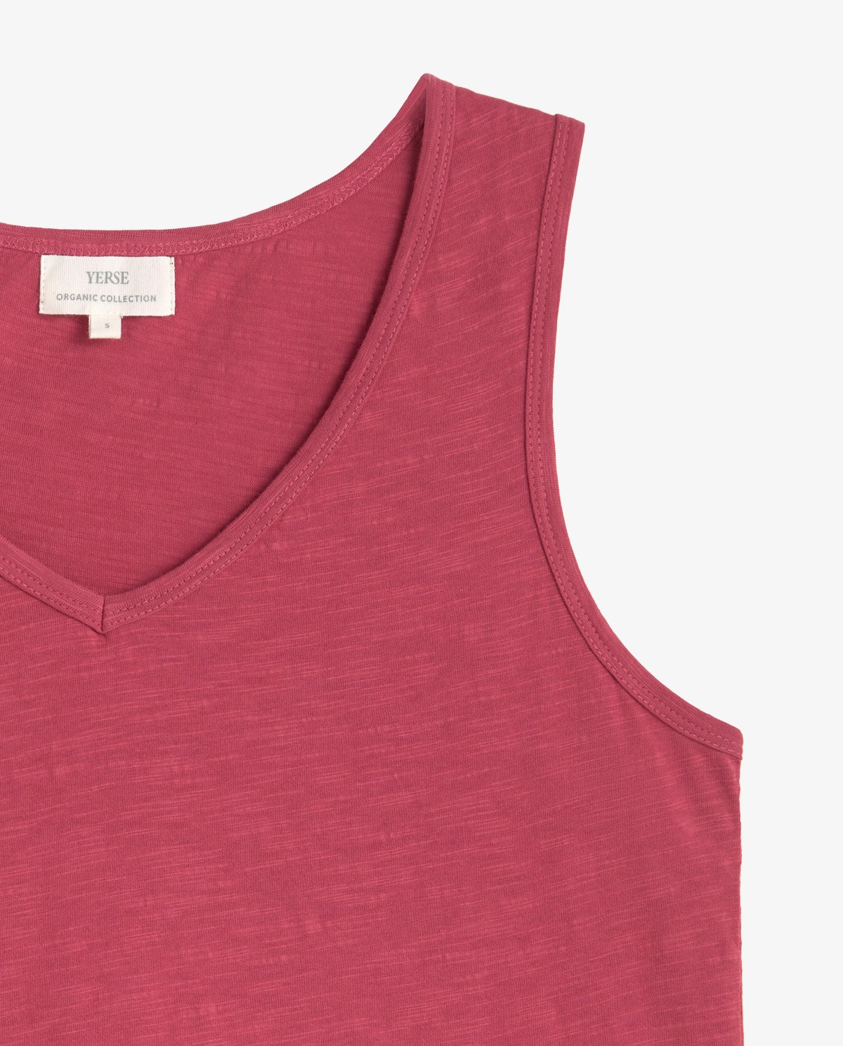 Top sin mangas algodón orgánico en color frambuesa, vista frontal con detalle del tejido 6