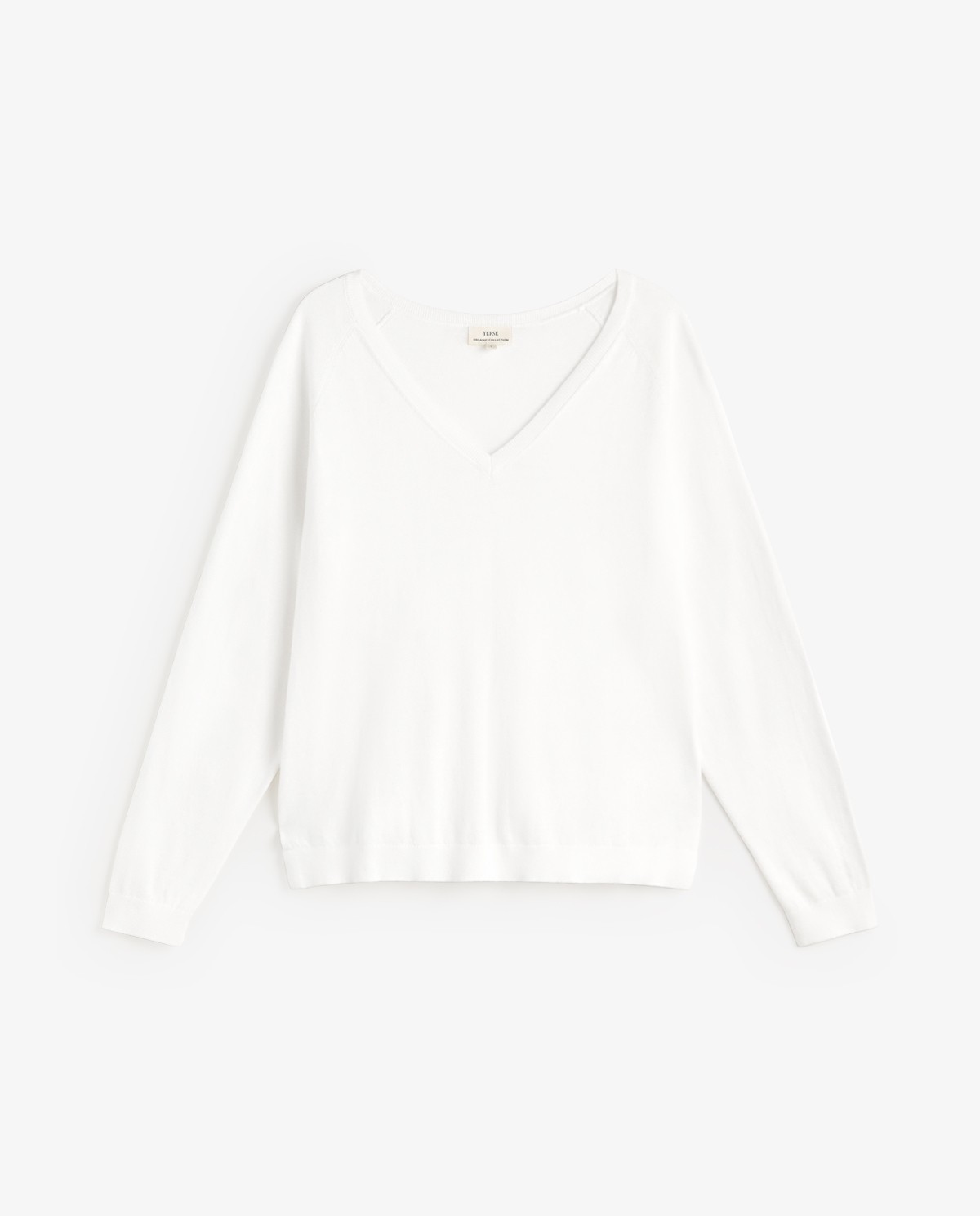 Jersey punto fino cuello pico en color blanco, vista frontal con detalle del tejido 9