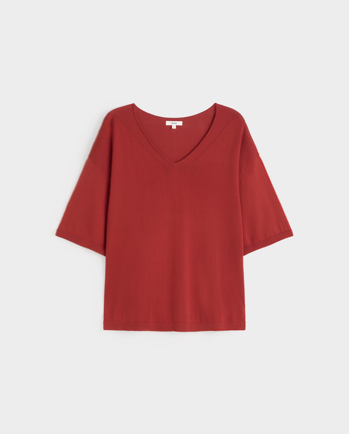 Jersey manga corta cuello pico en color Terracota, vista frontal con detalle del tejido 7