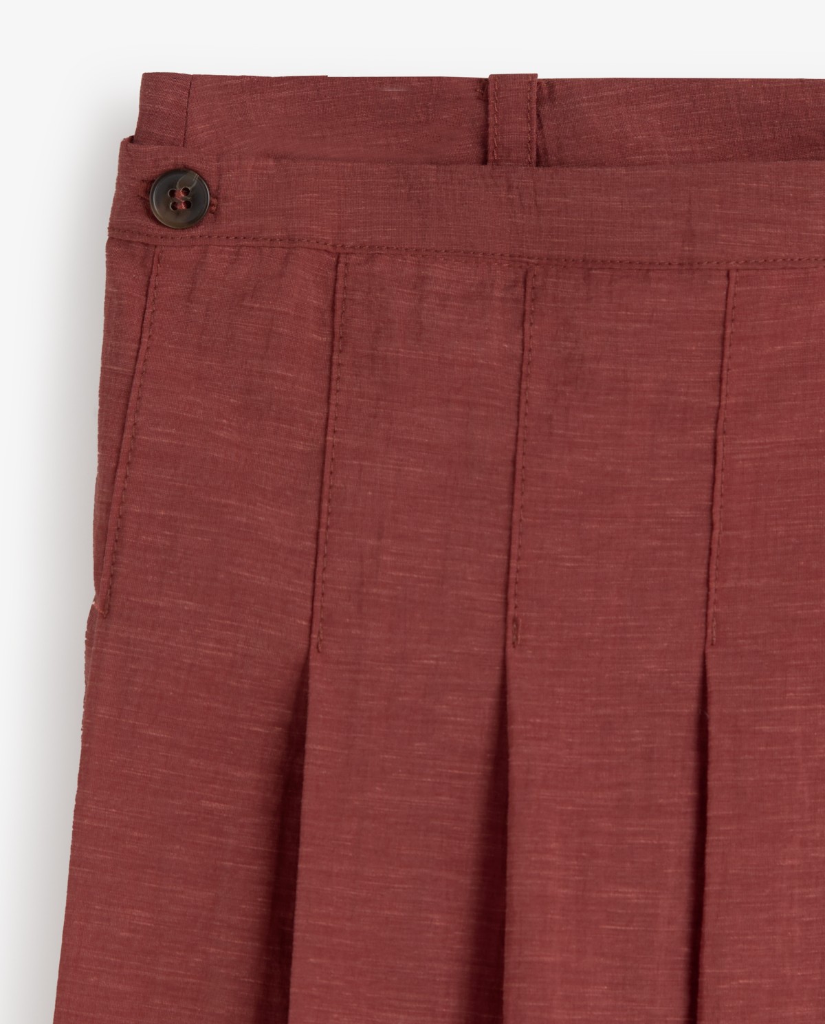 Falda larga doble capa extraíble en color terracota, vista frontal con detalle del tejido 12