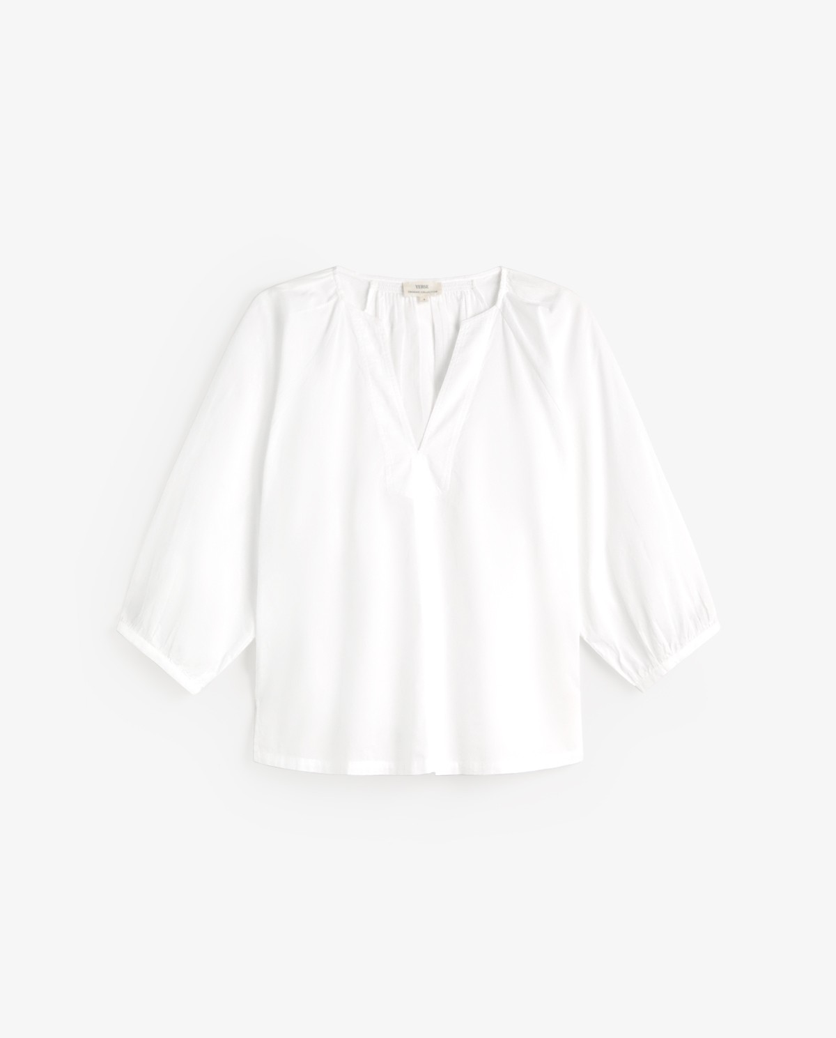 Blusa cuello tunecino algodón orgánico en color blanco, vista frontal con detalle del tejido 6