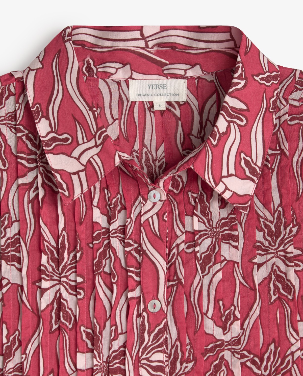 Vestido camisero 100% algodón orgánico en color frambuesa, vista frontal con detalle del tejido 8