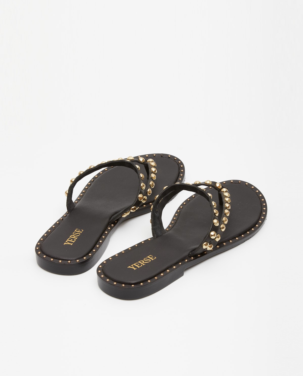 Sandalias planas piel con tachuelas