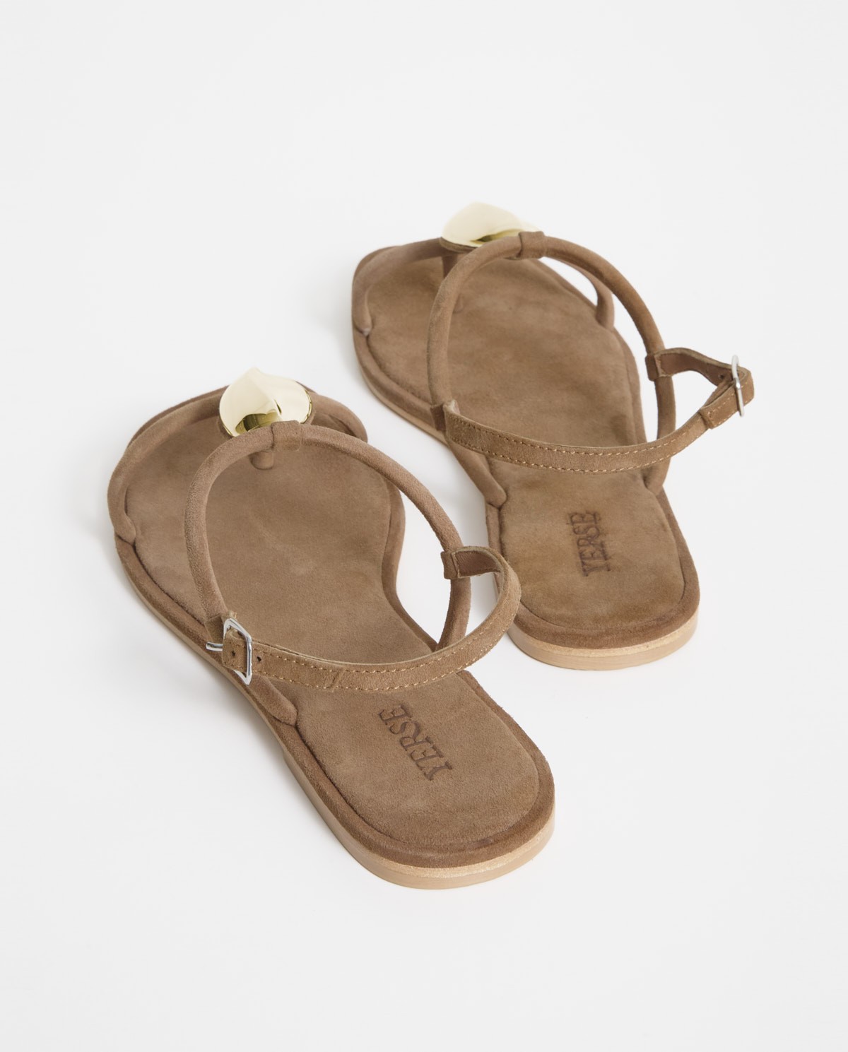 Sandales plates en cuir avec détail métallique