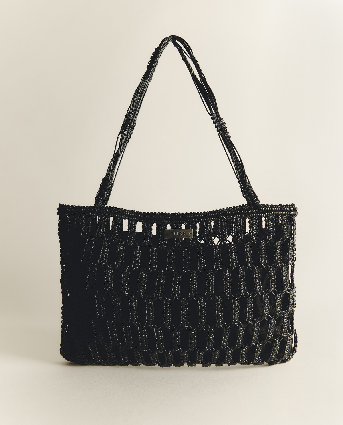 Bossa macramé tubular de pell|Yerse