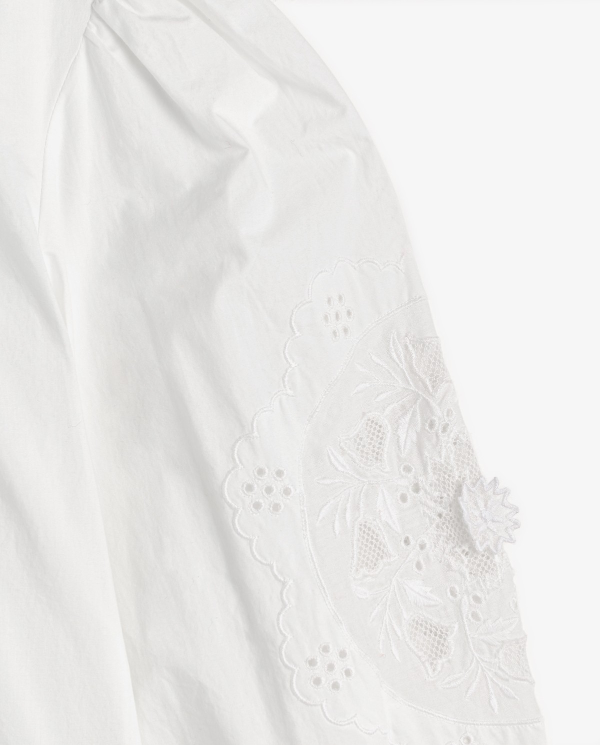 Blusa de algodón con bordados en color blanco 7