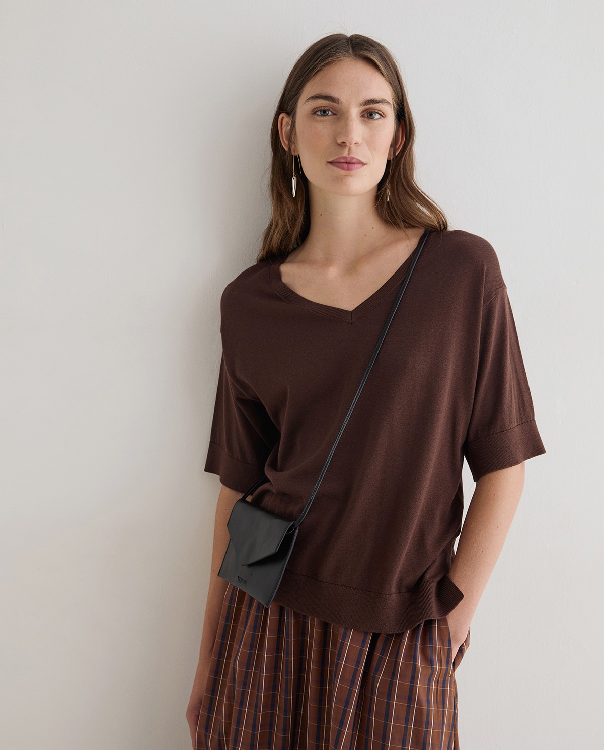 Bolso monedero de piel en color negro