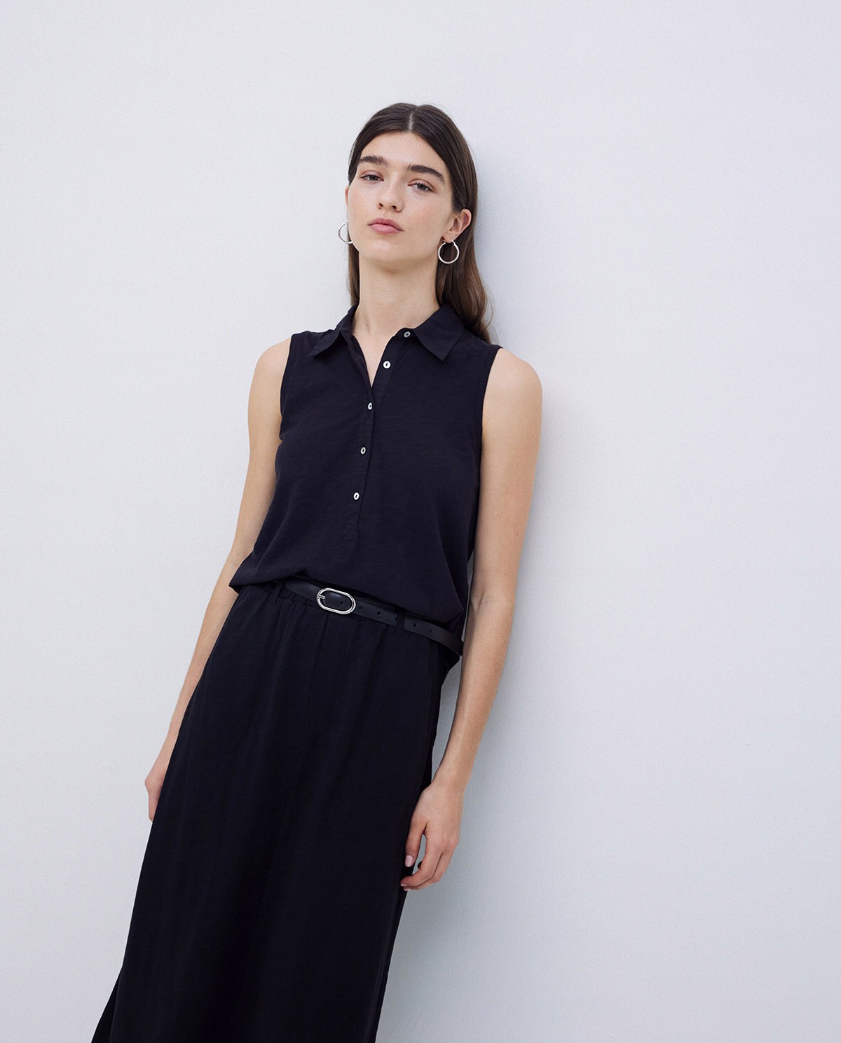 Top cuello polo botones negro 4