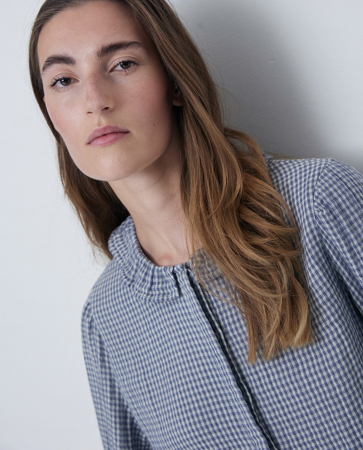 Plaid shirt ruffles lead