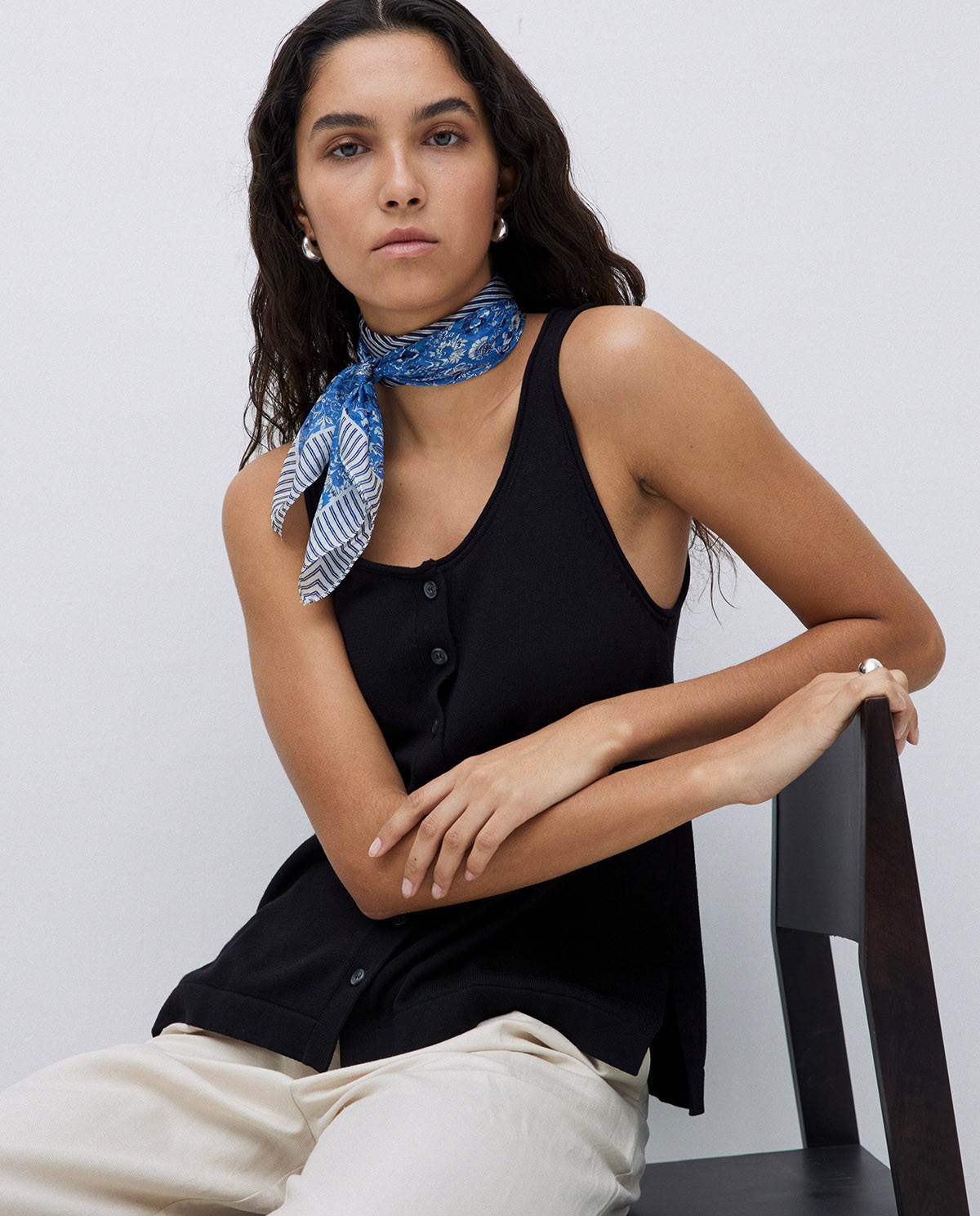 Black round-neck buttoned top