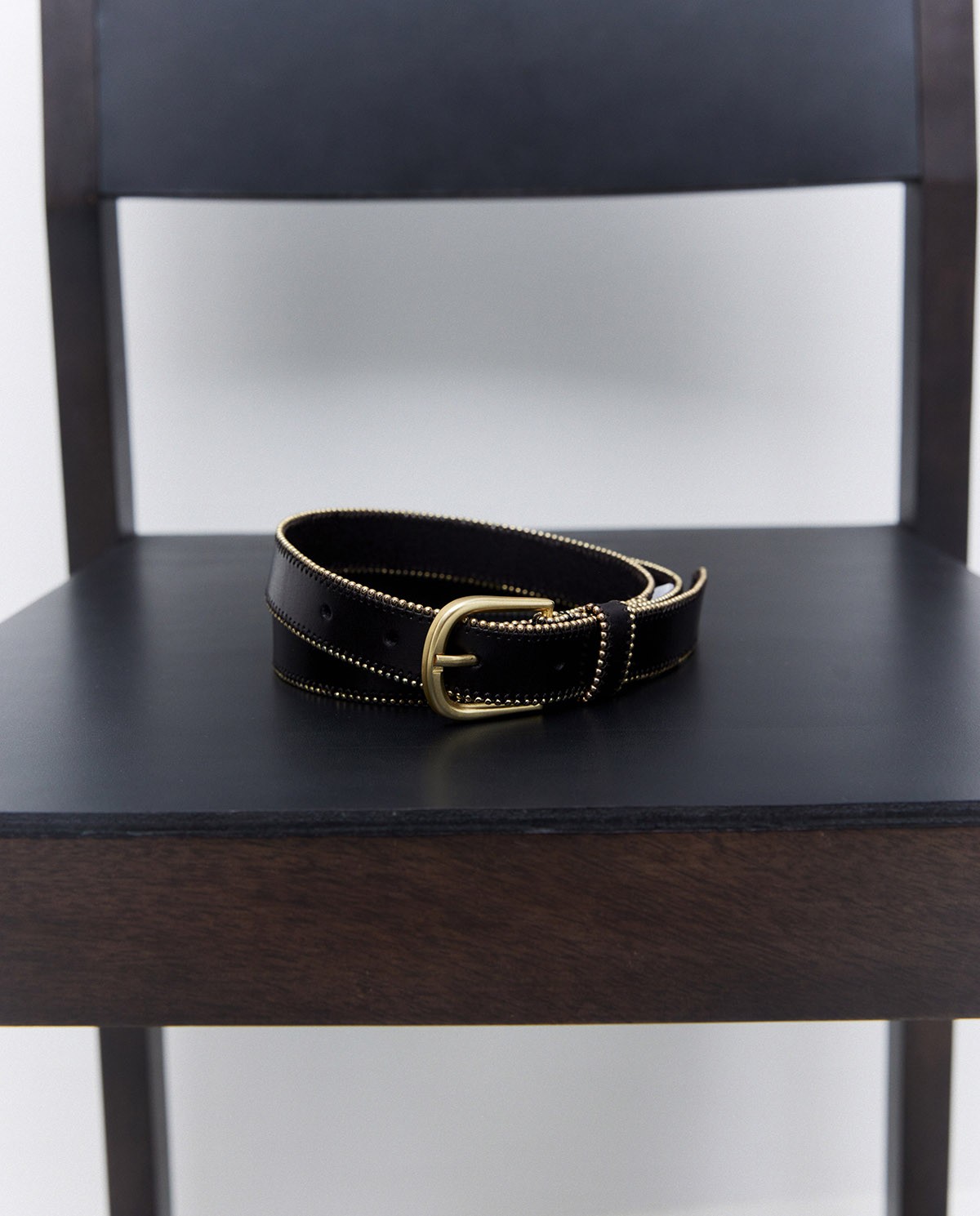 Black leather belt with metal beads